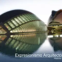 Edificios futuristas reflejados en el agua, un ejemplo de expresionismo arquitectónico.