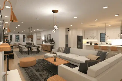 Un salón moderno y espacioso con sofá blanco, mesa de centro de madera y comedor. ¿Cuánto dura la carrera de diseño de interiores?