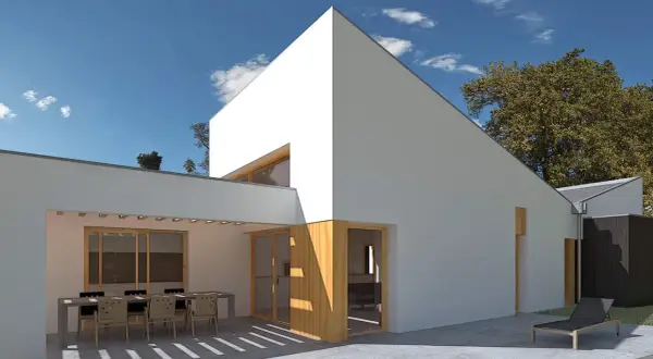 Casa moderna con patio y mesa. La orientación noreste aprovecha el sol de la mañana para iluminar el espacio.