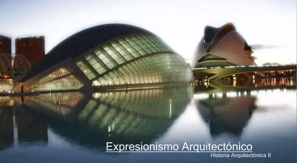 Edificios futuristas reflejados en el agua, un ejemplo de expresionismo arquitectónico.
