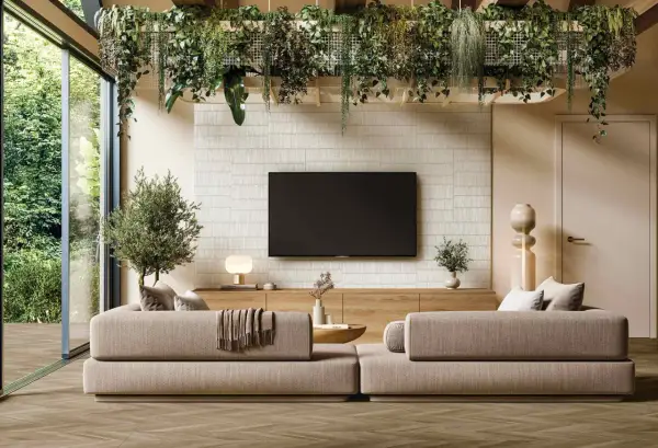 Salones modernos con paredes texturizadas y exuberante vegetación colgante. Sofás cómodos y una gran ventana que da a un jardín.